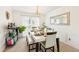 Bright dining room featuring a table set for dinner and a mirrored wall at 1850 Thomas Ne Dr, Marietta, GA 30066
