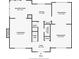 First-floor floorplan featuring a living room, kitchen, dining room, foyer, bathroom, and breakfast nook at 1850 Thomas Ne Dr, Marietta, GA 30066