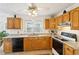 Charming kitchen with granite countertops, wooden cabinets, and modern appliances for a delightful cooking experience at 1850 Thomas Ne Dr, Marietta, GA 30066