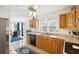 Bright kitchen area with granite countertops, a window view, and an adjacent dining area at 1850 Thomas Ne Dr, Marietta, GA 30066