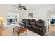 Comfortable living room with a reclining sofa and view into an adjacent dining area at 1850 Thomas Ne Dr, Marietta, GA 30066