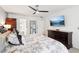 Spacious main bedroom with a ceiling fan, dresser, and decorative accents, creating a serene atmosphere at 1850 Thomas Ne Dr, Marietta, GA 30066