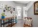 Charming entryway featuring a decorative console table and stylish wall accents at 303 Barberry Pl, Canton, GA 30114