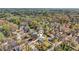 A home nestled among trees is captured from above in this picture of the surrounding neighborhood at 3087 Alston Dr, Decatur, GA 30032