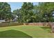 Expansive, level backyard enclosed by a wood fence, perfect for outdoor activities and privacy at 3087 Alston Dr, Decatur, GA 30032