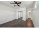 Spacious bedroom featuring dark hardwood floors, large closet, and ensuite bathroom at 3087 Alston Dr, Decatur, GA 30032