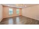 Bright bonus room features hardwood floors, recessed lighting, and large windows for natural light at 3087 Alston Dr, Decatur, GA 30032