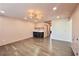 Elegant bonus room with hardwood flooring, modern lighting, and a stylish bar area at 3087 Alston Dr, Decatur, GA 30032