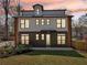 Modern two-story home boasts sleek lines, a minimalist landscape, and a welcoming turquoise front door at 3087 Alston Dr, Decatur, GA 30032