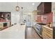 Gourmet kitchen featuring a large island, stainless steel appliances, and modern cabinetry at 3087 Alston Dr, Decatur, GA 30032