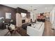 Bright and airy living space with hardwood floors and elegant furnishings, flows into kitchen at 3087 Alston Dr, Decatur, GA 30032