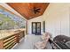 Outdoor patio with ceiling fan, gas grill, and view of backyard at 3087 Alston Dr, Decatur, GA 30032