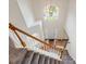 Inviting entryway with stairs, view of front door, and chandelier at 3515 Mcclure Woods Dr, Duluth, GA 30096