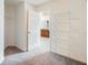 Spacious walk-in closet with wire shelving, with a glimpse into the bathroom at 3515 Mcclure Woods Dr, Duluth, GA 30096