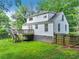 Backyard featuring a wooden deck and a partially fenced yard at 511 Ashburton Ave, Decatur, GA 30032