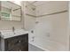 Bathroom features white subway tile in shower with modern vanity and fixtures at 511 Ashburton Ave, Decatur, GA 30032