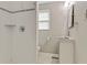 Bathroom with a shower stall, modern sink, and white subway tile at 511 Ashburton Ave, Decatur, GA 30032
