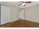 Bedroom featuring hardwood floors, ceiling fan and closet at 511 Ashburton Ave, Decatur, GA 30032