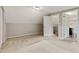 Bedroom featuring neutral walls, carpet, and white doors to adjacent rooms at 511 Ashburton Ave, Decatur, GA 30032