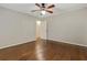 Bedroom featuring hardwood floors, ceiling fan and closet at 511 Ashburton Ave, Decatur, GA 30032