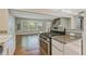 View of the modern kitchen featuring a gas range and granite countertops at 511 Ashburton Ave, Decatur, GA 30032