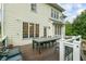 Outdoor deck featuring an outdoor dining area, perfect for entertaining at 1140 Promontory Drive, Marietta, GA 30062