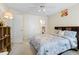 Bedroom with ensuite bathroom and adjacent custom shelving for ample storage space at 1140 Promontory Drive, Marietta, GA 30062
