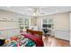 Comfortable bedroom featuring large windows, a built-in desk, and a cozy window seat for a relaxing retreat at 1140 Promontory Drive, Marietta, GA 30062