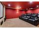 Home theater featuring black leather reclining seating at 1140 Promontory Drive, Marietta, GA 30062