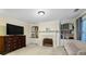 Comfortable living room with built-in cabinets, and a faux fireplace at 1140 Promontory Drive, Marietta, GA 30062