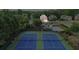 Aerial view of community tennis courts, swimming pool and clubhouse, surrounded by mature trees and upscale homes at 1140 Promontory Drive, Marietta, GA 30062