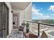 Balcony with wicker seating overlooking the city, providing a serene outdoor space at 1280 W Peachtree Nw St # 2205, Atlanta, GA 30309