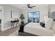 Stylish bedroom with work space and access to balcony at 1280 W Peachtree Nw St # 2205, Atlanta, GA 30309