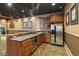 Common area features a kitchenette with stainless steel appliances and ample counter space at 1280 W Peachtree Nw St # 2205, Atlanta, GA 30309