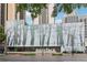 Modern office building featuring a striking glass facade with a forest motif in a bustling urban setting at 1280 W Peachtree Nw St # 2205, Atlanta, GA 30309