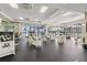 Well-equipped fitness center featuring modern Cybex machines, with floor to ceiling windows providing natural light at 1280 W Peachtree Nw St # 2205, Atlanta, GA 30309