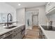 Modern kitchen with stainless steel appliances, quartz countertops, and an open design at 1280 W Peachtree Nw St # 2205, Atlanta, GA 30309