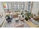 Spacious lobby with floor-to-ceiling windows, comfortable seating, and a grand piano at 1280 W Peachtree Nw St # 2205, Atlanta, GA 30309