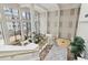 Open lobby with floor-to-ceiling windows and staircase at 1280 W Peachtree Nw St # 2205, Atlanta, GA 30309