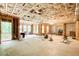 Unfinished basement with exposed utilities and large windows, ready to be finished at 13067 Overlook Pass, Roswell, GA 30075