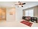 Spacious bonus room with carpet flooring, a ceiling fan, and versatile space for various activities at 13067 Overlook Pass, Roswell, GA 30075