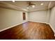 Bedroom featuring wood floors, a window and decorative trey ceiling at 2822 Salem Oak Way, Duluth, GA 30096