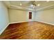 Bedroom featuring wood floors, a window and decorative trey ceiling at 2822 Salem Oak Way, Duluth, GA 30096