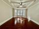 Spacious bedroom with tray ceilings, natural light, and hardwood floors at 2822 Salem Oak Way, Duluth, GA 30096