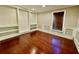 Bedroom with built-in shelving and hardwood flooring at 2822 Salem Oak Way, Duluth, GA 30096