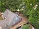 Aerial view showcasing the home's backyard, fencing, and overall property layout at 565 Saint James Ct, Lawrenceville, GA 30044