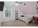 Inviting bedroom featuring soft carpet, a ceiling fan, and a cozy sleeping space at 565 Saint James Ct, Lawrenceville, GA 30044