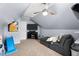 Angle view of attic bonus room showcasing the furniture layout at 565 Saint James Ct, Lawrenceville, GA 30044