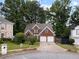 Beautiful brick home with a two-car garage on a well-kept lot in a desirable neighborhood at 565 Saint James Ct, Lawrenceville, GA 30044
