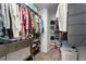 Spacious walk-in closet with ample storage and organizational features at 565 Saint James Ct, Lawrenceville, GA 30044